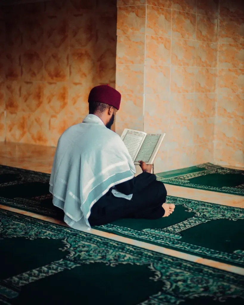 Man reciting the Quran with Tajweed